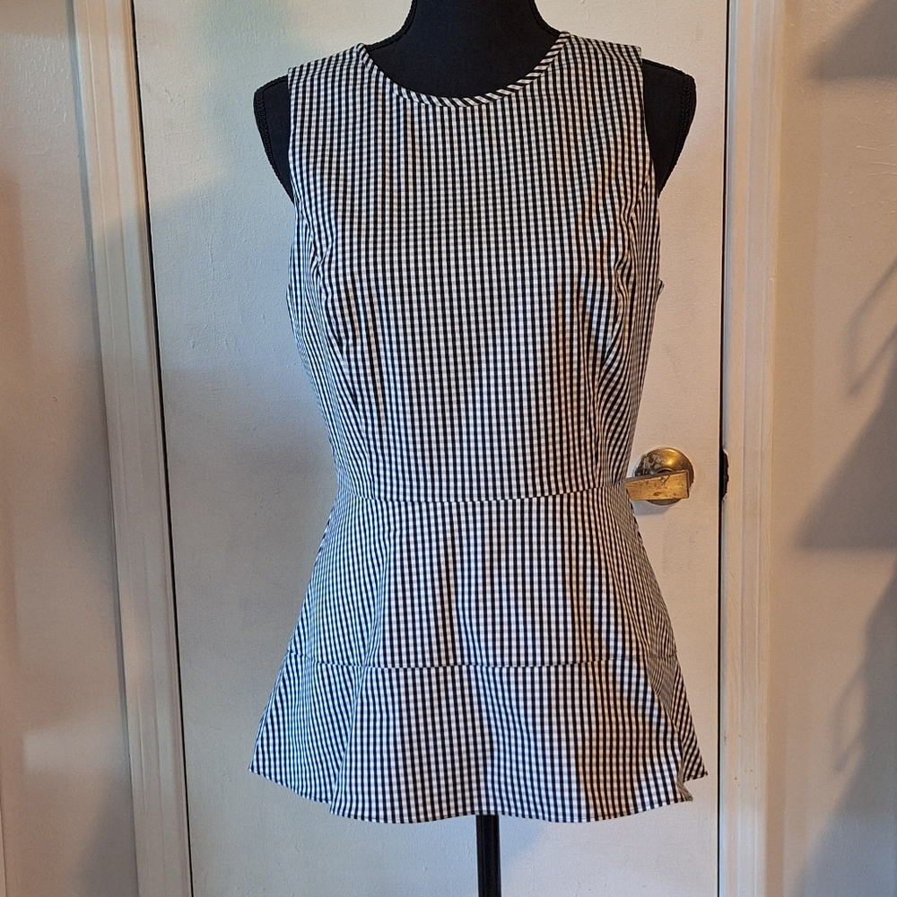 Sleeveless Peplum Top